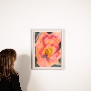 Someone looking at an abstract painting, made with acrylic with shades of pink light orange and light black made by MF BAE exhibited at the Wishbone art Gallery
