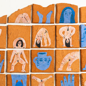 Artistic depiction of human figures and abstract shapes on square tiles.